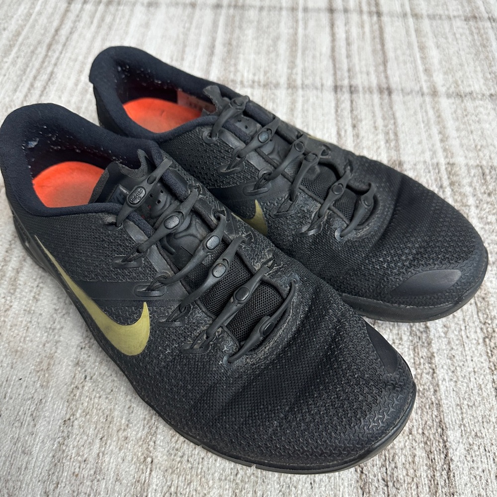 Nike Metcon Black and Gold Sneakers